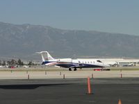 N259FX @ ONT - Rapidly taxiing towards runway 26L - by Helicopterfriend