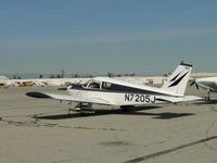 N7205J @ CNO - Parked north of the hanger - by Helicopterfriend