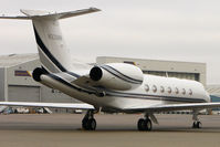N332MM @ EGGW - Gulfstream Aerospace GV-SP (G550), c/n: 5283 at Luton - by Terry Fletcher