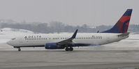 N394DA @ KMSP - A little smoke on engine start - by Todd Royer