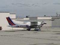 N40EC @ CNO - Covered up. tied down and parked - by Helicopterfriend