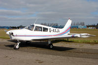 G-AXJX @ EGNU - 1969 Piper PIPER PA-28-140, c/n: 28-25990 at Full Sutton - by Terry Fletcher