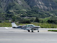 N856R @ SZP - 1959 Beech 35-33 DEBONAIR, Continental IO-470-J 225 Hp, landing roll Rwy 22 - by Doug Robertson