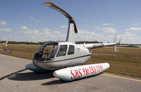 N644MH @ FMY - Robinson R44 - by Mauricio Morro