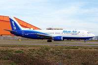 YR-BAK @ EGGW - Blue Air's Boeing 737-430, c/n: 27005 taxying for departure from London - by Terry Fletcher