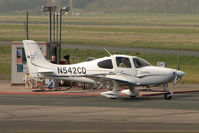 N542CD @ EGBJ - 2004 Cirrus Design Corp SR22, c/n: 1186 at Staverton pump - by Terry Fletcher