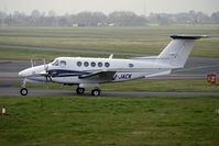 M-JACK @ EGBJ - Beech Aircraft B200GT, c/n: BY-94 at Staverton - by Terry Fletcher