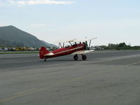N66711 @ SZP - 1941 Boeing Stearman IB75A, Jacobs R-755B2 275 Hp upgrade, taxi off the active - by Doug Robertson