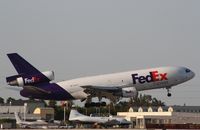 N399FE @ KMIA - MD-10-10F - by Mark Pasqualino