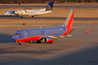 N626SW @ ORF - Southwest Airlines N626SW (FLT SWA232) taxiing to the gate from Baltimore/Washington Int'l (KBWI) as United Express (Colgan Air) N333NG taxis to RWY 23 for departure to Newark, NJ.