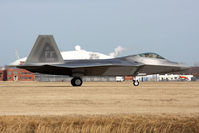 08-4168 @ LFI - USAF Lockheed Martin F-22A Raptor 08-4168 of the 94th FS Spads taxiing to the ramp after landing RWY 26.