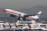 B-2077 @ LAX - China Cargo Airlines B-2077 (FLT CKK222) climbing out from RWY 25R en route to Shanghai Pudong Int'l (ZSPD). - by Dean Heald