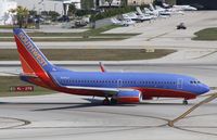 N246LV @ KFLL - Boeing 737-700 - by Mark Pasqualino