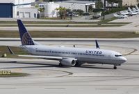 N37437 @ KFLL - Boeing 737-900ER - by Mark Pasqualino