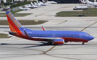 N760SW @ KFLL - Boeing 737-700 - by Mark Pasqualino