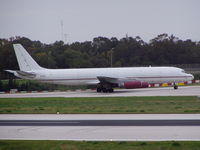 9G-AED @ LMML - DC8 9G-AED Air Charter Express taxing into the main parking area at Malta International Airport. - by raymond