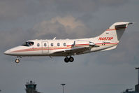 N497XP @ EIDW - On short finals r/w 28 - by Robert Kearney