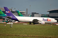N718FD @ EIDW - On tow over to cargo
