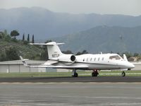 N977JP @ POC - Eastbound on taxiway Sierra heading to runway 26L for take off before the rain arrives - by Helicopterfriend