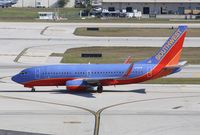 N718SW @ KFLL - Boeing 737-700 - by Mark Pasqualino