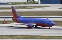 N370SW @ KFLL - Boeing 737-300 - by Mark Pasqualino