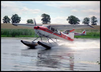 C-FJOC - Departure from Oshkosh lake - 1987. - by Ralph Lunt