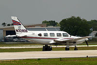 N328DB @ KLAL - Piper PA-31-325 Navajo C/R [31-7712026] Lakeland-Linder~N 15/04/2010. - by Ray Barber