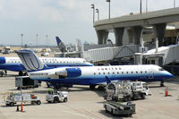 N932SW @ DFW - United Express at the gate - DFW Airport - by Zane Adams