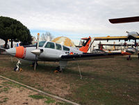 E20-1 @ LECU - Nice classic Beech in Spanish Air Force color scheme. - by Daniel L. Berek