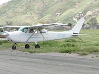 N3750F @ RIR - Parked in the grass and tied down - by Helicopterfriend