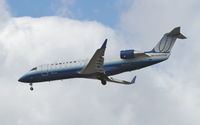 N982SW @ KORD - SkyWest/United Express Bombardier CL-600-2B19, SKW6954 arriving from KFAR, on approach RWY 28 KORD. - by Mark Kalfas