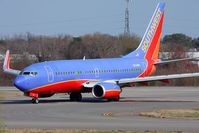 N234WN @ ORF - Southwest Airlines N234WN exiting RWY 5 at Taxiway Echo after landing.
