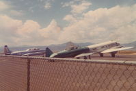 N3151G @ KBJC - Photographed from a car window, cropped from a 126 3X5 photo. - by Glenn E. Chatfield