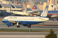 N482UA @ KLAX - United Airlines Airbus A320-232, arriving KLAX off 25L on TWY P. - by Mark Kalfas