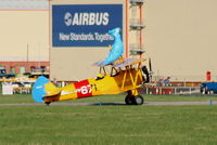 G-CGPY @ EGNR - promoting the new animated film 'Rio' taking 'Blu' wingwalking - by Chris Hall