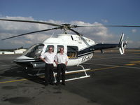 5R-MAY @ FQPB - BELL 407 5R-MAY Captain Jean-Christophe Lavaux and Copilot Stephane GEAY during Refueling at Pemba Mozambique. - by Hepouloom KOUROUMBA