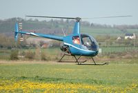 G-MDKD @ EGFP - Arriving Pembrey Airport. Operated by Heli-air Wales based at Swansea Airport. - by Roger Winser
