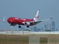 VH-VUE @ YMML - Virgin Blue Boeing 737 Victor Uniform Echo over the fence approaching runway 34 at Melbourbe (Tullamarine) - by red750