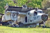 149888 - On the West Side of US-1 about 1 mile south of St.Augustine Airport FL - there is a grassed compound holding 9 x Ex Navy , Grumman Trackers