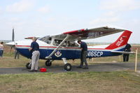 N165CP @ KCVB - CAP plugs in the APU to demonstrate its Garmin G1000 cockpit. - by Darryl Roach