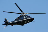 G-EMHC @ X4AT - Ferrying racegoers into Aintree for the 2011 Grand National - by Chris Hall