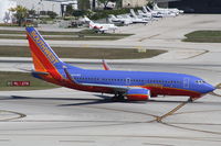 N943WN @ KFLL - Boeing 737-700 - by Mark Pasqualino