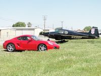 N1088P @ AJO - Parked in the grass with a red companion - by Helicopterfriend