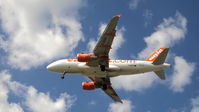 G-EZGA @ LFPO - Airbus A319-111 landing runway 26