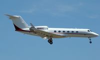 N616CC @ KSAT - Landing 12R - by RWB