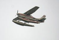 N6243Z - Taken from Seattle Wells Fargo Tower.  Cannon EOS 40D with OM-SYSTEM ZUIKO 500 mm Reflex 1:8.
1:53:21pm
F8
1/1600 sec
ISO 1600
Photoshop for contrast and saturation - by Jill England