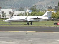 N977JP @ POC - Rolling westbound on runway 26L preparing to lift off - by Helicopterfriend