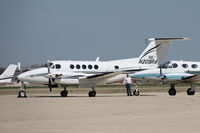 N205RA @ KDPA - Photographed through a chain-link fence - by Glenn E. Chatfield