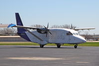 N742CC @ KDPA - Photographed through a chain-link fence.  Parked on the Muckenschnabl ramp.