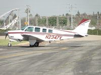 N2347V @ POC - Taxiing to runway 26L - by Helicopterfriend